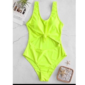 Neon green cut out one piece bathing suit